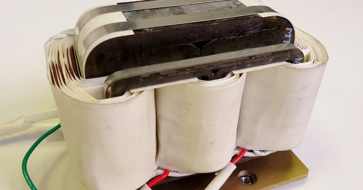 Three-phase transformer coil with wrapped windings.